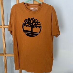 Like new timberland tshirt size large men’s burnt orange color